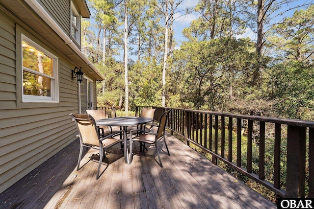 deck featuring outdoor dining space