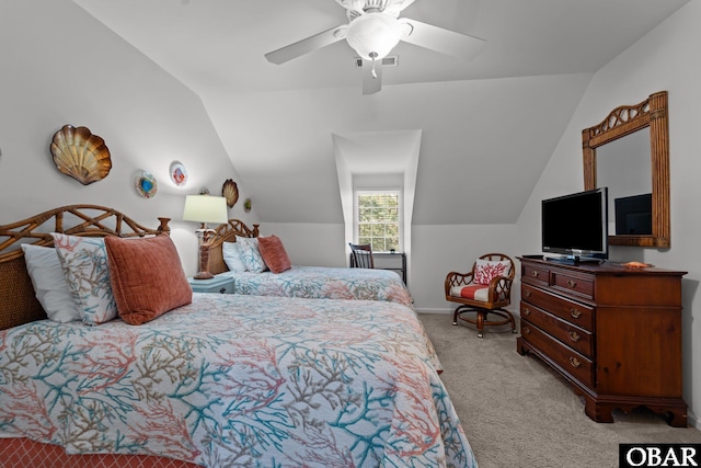 carpeted bedroom with lofted ceiling, baseboards, and ceiling fan