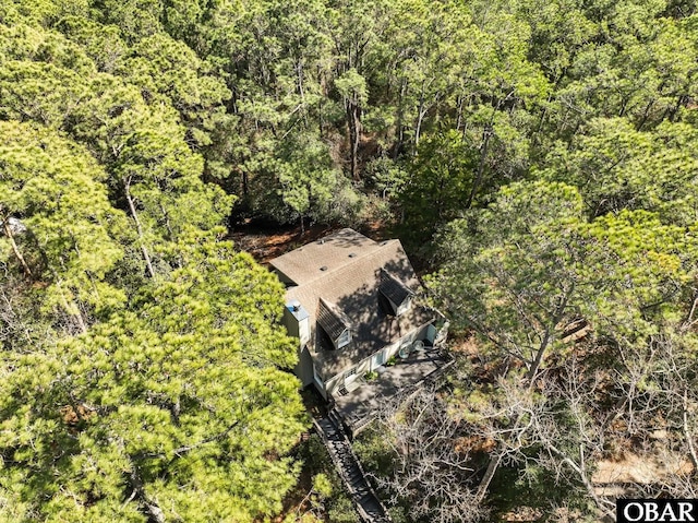 bird's eye view with a forest view