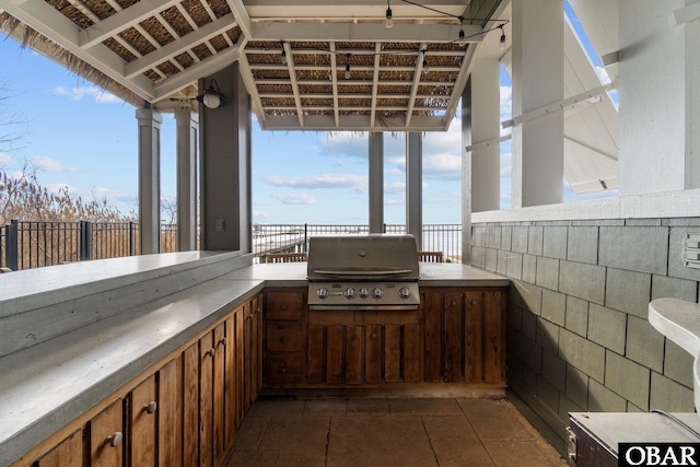 view of patio / terrace featuring exterior kitchen and grilling area