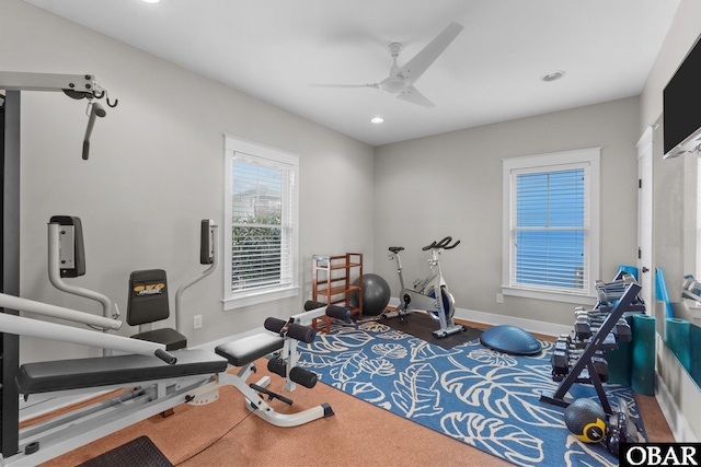 exercise area featuring ceiling fan, baseboards, and recessed lighting