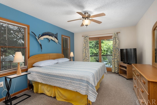 bedroom featuring access to outside, light carpet, ceiling fan, and a textured ceiling