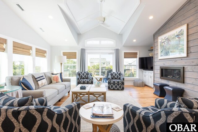 123 Skimmer Way Lot 48, Duck, NC 27949 - living area featuring light wood finished floors, plenty of natural light, beam ceiling, high vaulted ceiling, and recessed lighting