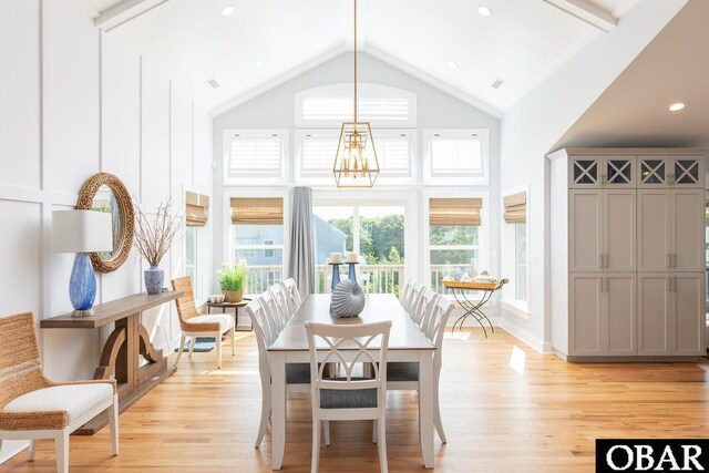 123 Skimmer Way Lot 48, Duck, NC 27949 - dining space with high vaulted ceiling, light wood finished floors, a chandelier, beam ceiling, and recessed lighting