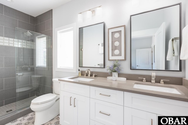 123 Skimmer Way Lot 48, Duck, NC 27949 - bathroom with double vanity, toilet, and a stall shower