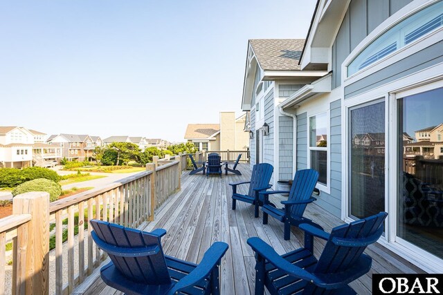 123 Skimmer Way Lot 48, Duck, NC 27949 - deck featuring outdoor dining space and a residential view