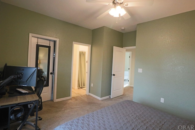 bedroom with baseboards, a ceiling fan, and light colored carpet