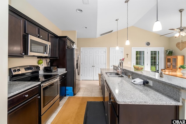 715 Arvilla Ln Lot 4, Manteo, NC 27954 - kitchen featuring appliances with stainless steel finishes, an island with sink, a ceiling fan, pendant lighting, and high vaulted ceiling