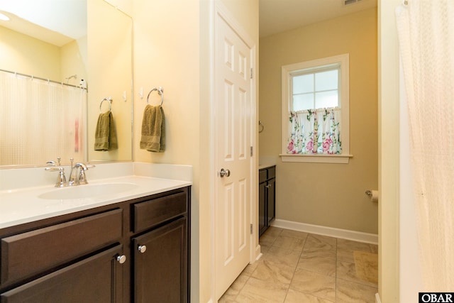 715 Arvilla Ln Lot 4, Manteo, NC 27954 - full bathroom with vanity and marble finish flooring