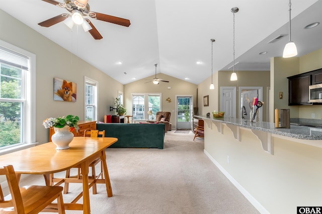715 Arvilla Ln Lot 4, Manteo, NC 27954 - dining room with ceiling fan, vaulted ceiling, and light carpet