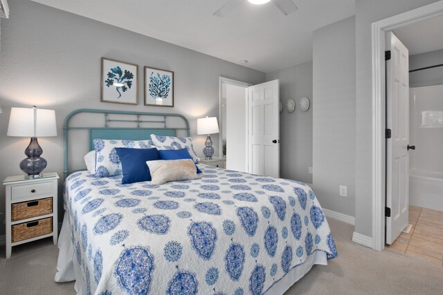 bedroom with carpet flooring, a ceiling fan, and baseboards