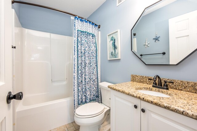 full bath with shower / tub combo, toilet, and vanity