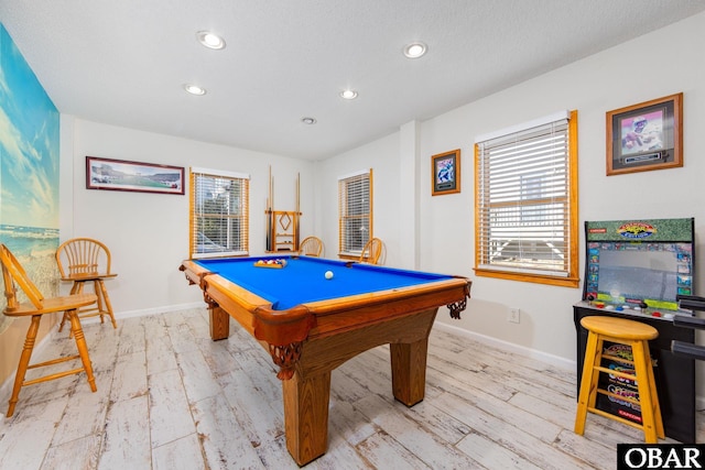 playroom with light wood finished floors, recessed lighting, baseboards, and pool table