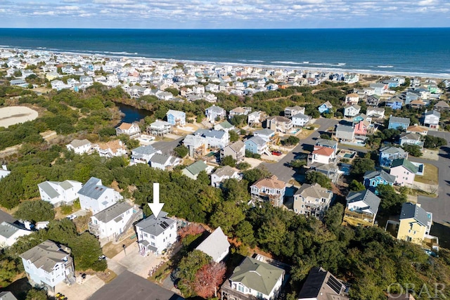 bird's eye view with a residential view and a water view