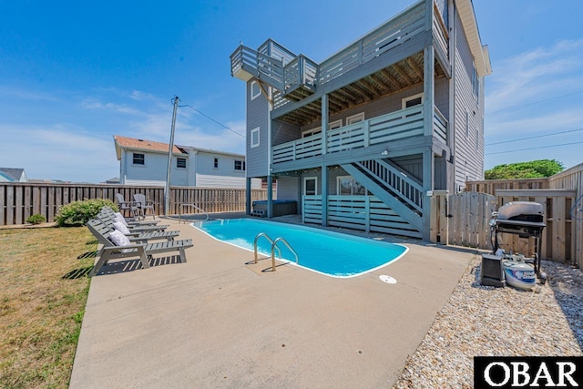 108 E Fresh Pond Dr Lot 24, Kill Devil Hills, NC 27948 - view of pool with a fenced backyard, a patio area, stairway, and a grill