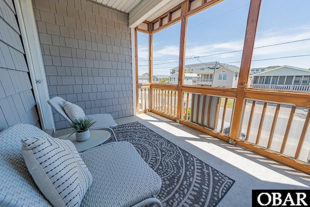 108 E Fresh Pond Dr Lot 24, Kill Devil Hills, NC 27948 - sunroom with a residential view