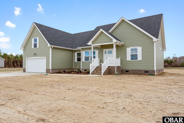 view of front of property with crawl space, a garage, roof with shingles, and driveway