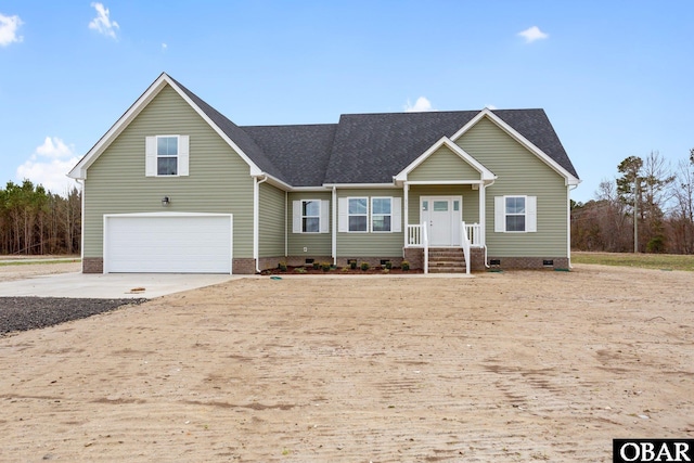 view of front facade with crawl space, concrete driveway, an attached garage, and a shingled roof