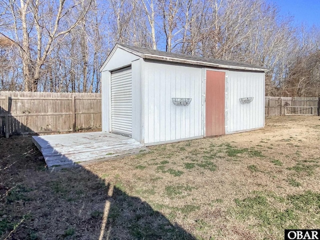 view of shed featuring a fenced backyard