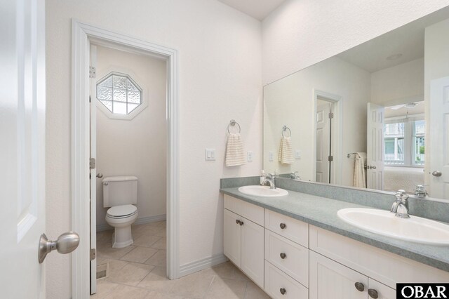716 Moongate Ln Lot 51, Corolla, NC 27927 - full bath featuring toilet, double vanity, and tile patterned flooring