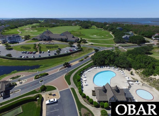 716 Moongate Ln Lot 51, Corolla, NC 27927 - drone / aerial view of a pool area and a nearby body of water