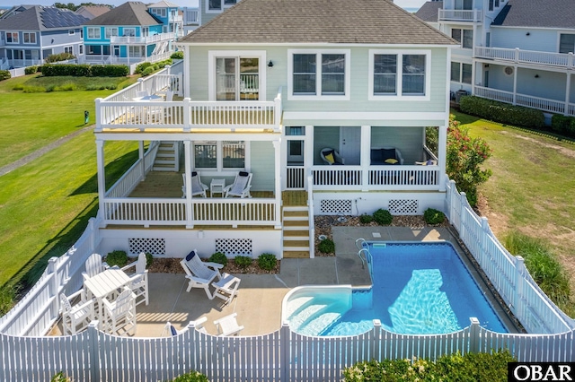716 Moongate Ln Lot 51, Corolla, NC 27927 - back of house featuring stairway, a shingled roof, a deck, and a patio area