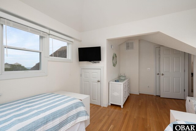716 Moongate Ln Lot 51, Corolla, NC 27927 - bedroom featuring light wood-style flooring and baseboards