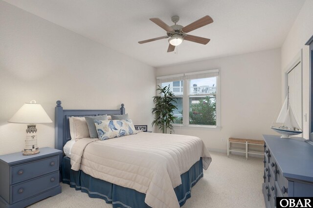716 Moongate Ln Lot 51, Corolla, NC 27927 - bedroom featuring a ceiling fan and light colored carpet