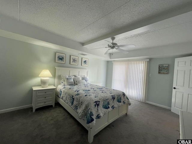 bedroom with baseboards, a ceiling fan, a textured ceiling, and dark carpet