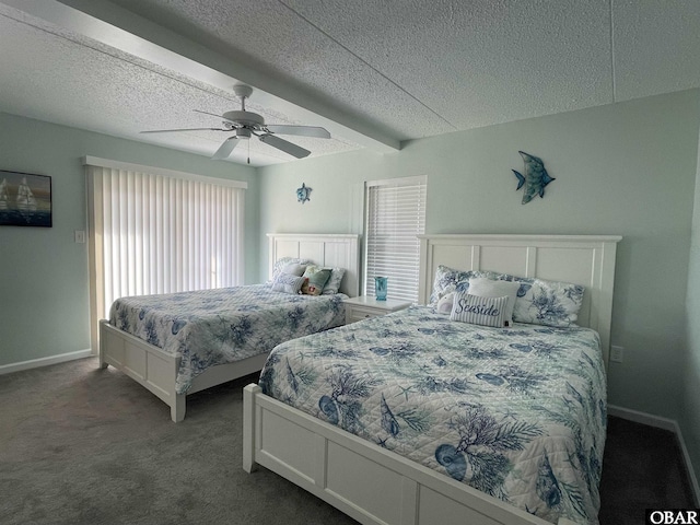 bedroom with baseboards, carpet, a ceiling fan, and a textured ceiling