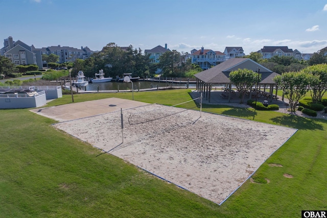 612 Pirates Way Unit # 612B, Manteo, NC 27954 - view of community featuring volleyball court, a gazebo, a lawn, a residential view, and a water view