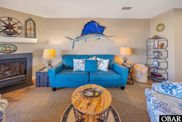 612 Pirates Way Unit # 612B, Manteo, NC 27954 - living room with a fireplace with flush hearth and wood finished floors