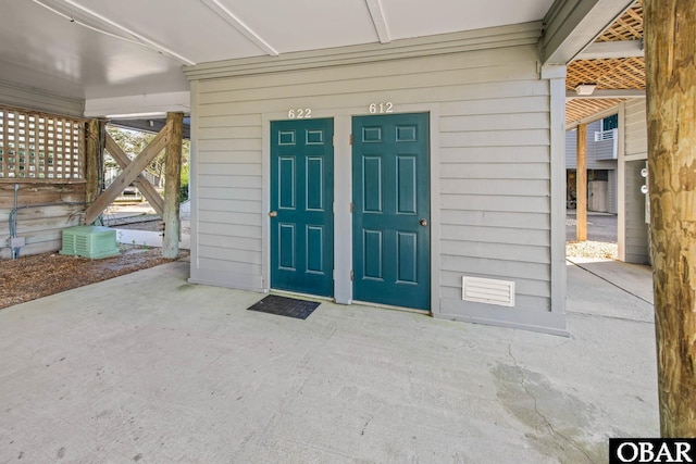 612 Pirates Way Unit # 612B, Manteo, NC 27954 - doorway to property featuring a patio