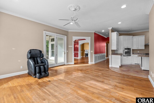 50336 Great Ridge Rd, Frisco, NC 27936 - unfurnished room with arched walkways, ceiling fan, recessed lighting, baseboards, and light wood-style floors