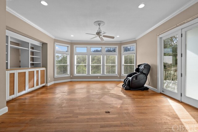 50336 Great Ridge Rd, Frisco, NC 27936 - unfurnished room with light wood-style floors, baseboards, crown molding, and recessed lighting