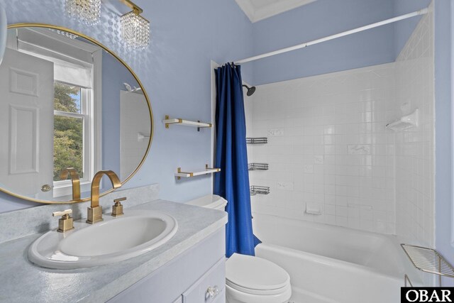 50336 Great Ridge Rd, Frisco, NC 27936 - full bathroom with shower / bath combination with curtain, ornamental molding, vanity, and toilet