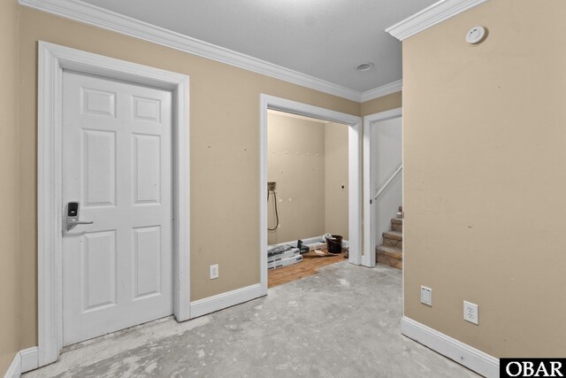 50336 Great Ridge Rd, Frisco, NC 27936 - unfurnished bedroom featuring ornamental molding, concrete floors, and baseboards
