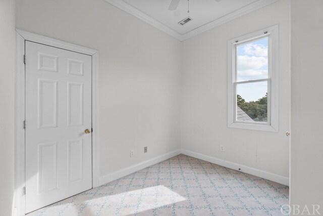 50336 Great Ridge Rd, Frisco, NC 27936 - unfurnished room featuring baseboards, visible vents, a ceiling fan, and ornamental molding