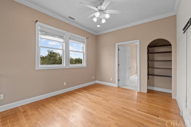 50336 Great Ridge Rd, Frisco, NC 27936 - unfurnished bedroom with ornamental molding, light wood finished floors, visible vents, and baseboards