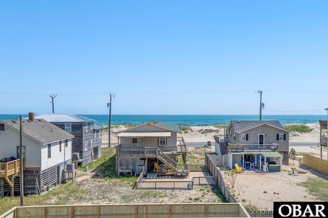 4023 Lindbergh Ave Lot # 65, Kitty Hawk, NC 27949 - water view featuring stairs and a fenced backyard