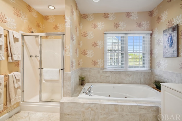 bathroom with a whirlpool tub, tile patterned flooring, a shower stall, and wallpapered walls