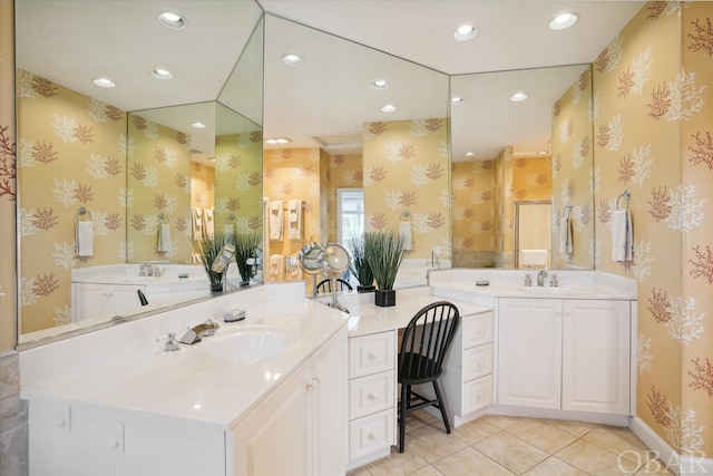 bathroom with wallpapered walls, recessed lighting, vanity, and tile patterned floors