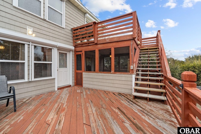 wooden terrace featuring stairway