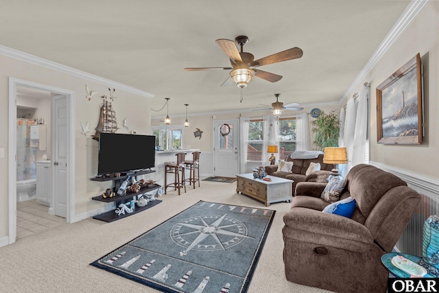 carpeted living room with crown molding