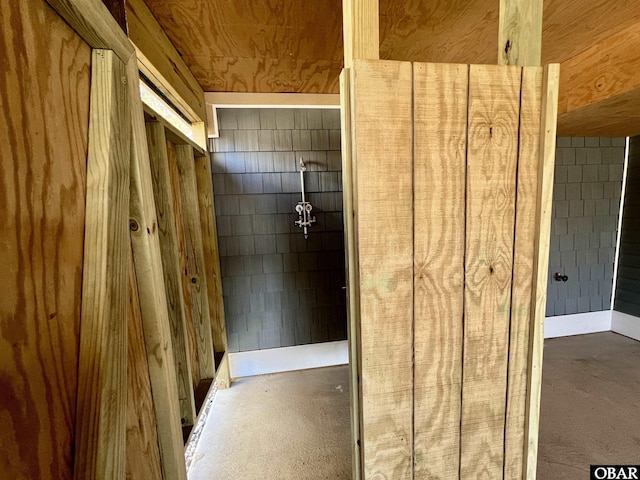 bathroom featuring concrete flooring