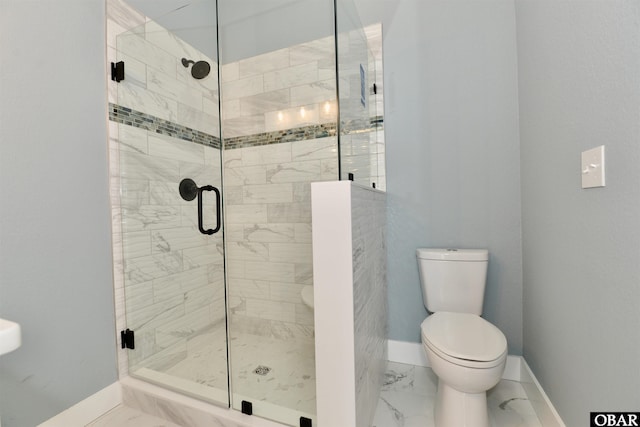 full bath featuring a stall shower, marble finish floor, toilet, and baseboards