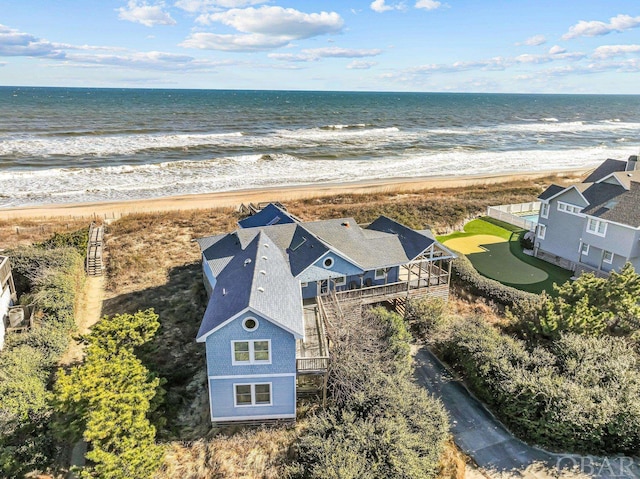 aerial view with a view of the beach and a water view