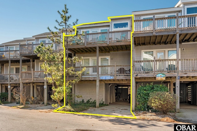 view of property featuring a carport