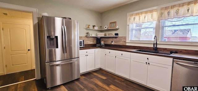 1034 N NC Highway 37, Gates, NC 27937 - kitchen with open shelves, a sink, appliances with stainless steel finishes, white cabinetry, and dark wood-style flooring