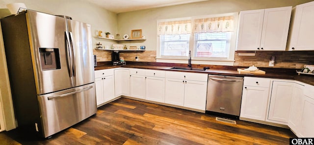 1034 N NC Highway 37, Gates, NC 27937 - kitchen featuring backsplash, dark countertops, stainless steel appliances, and a sink